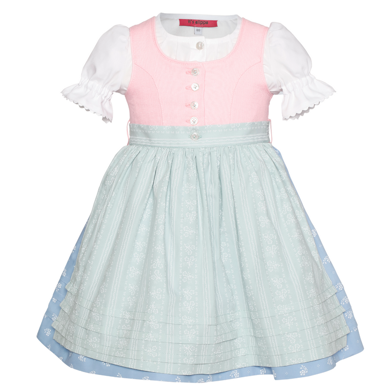 Unser Babydirndl werden nach traditionellen Schnitten gefertigt. Die echten Perlmuttknöpfe werden im Bäumchenstich angenäht.