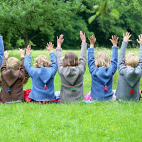 it‘s alippa_SALE Kinderstrickjacke mit Kapuze und Quaste - Kinderstrickjacke